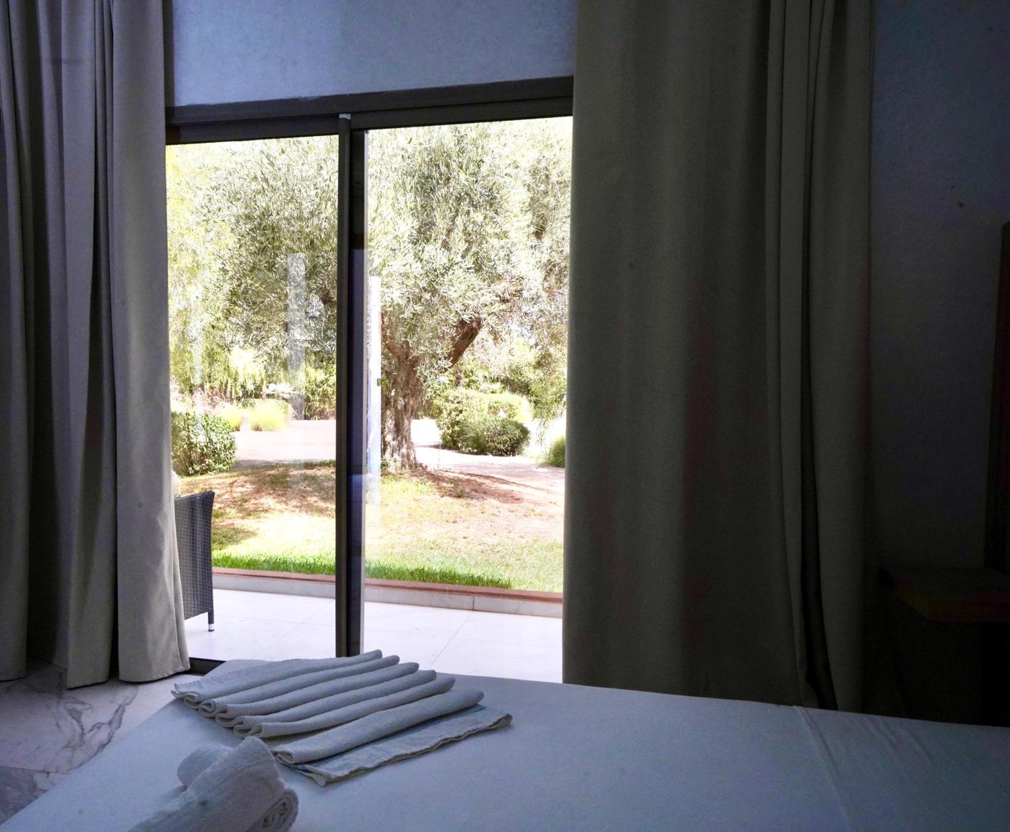 Ourika Camp Suites Hotel & Resort El Harkat 外观 照片