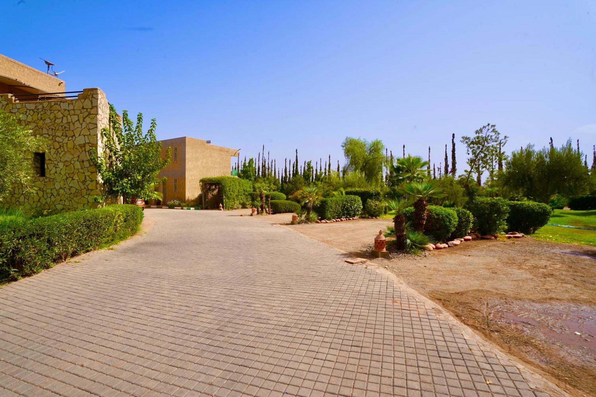 Ourika Camp Suites Hotel & Resort El Harkat 外观 照片